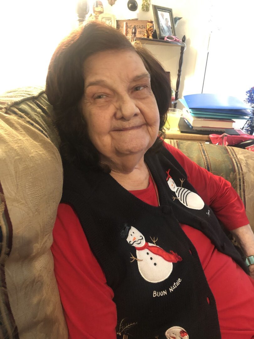 A Woman in a Christmas Themed Vest